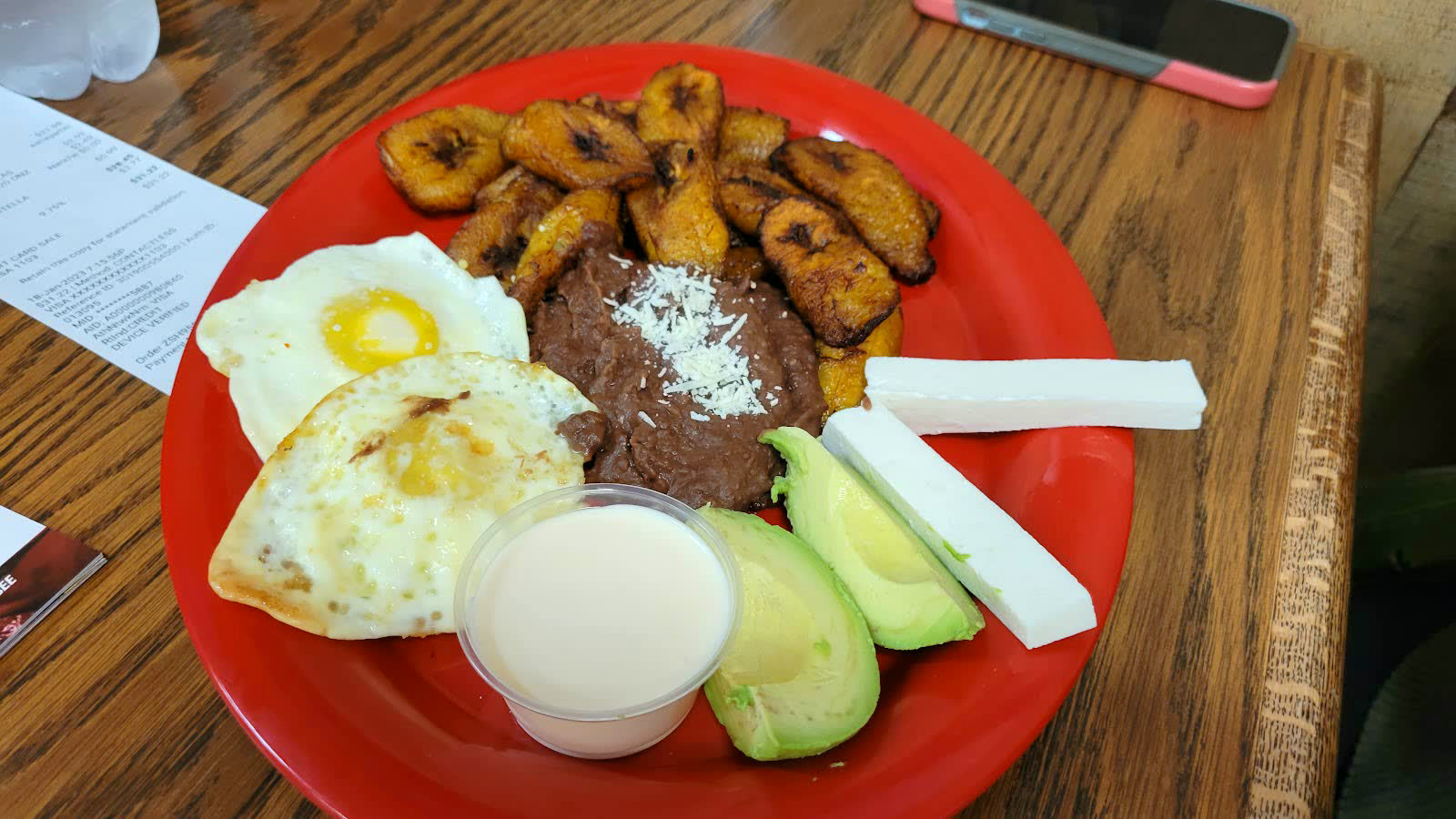 Nela's Tacos plato tipico with fried plantains and eggs